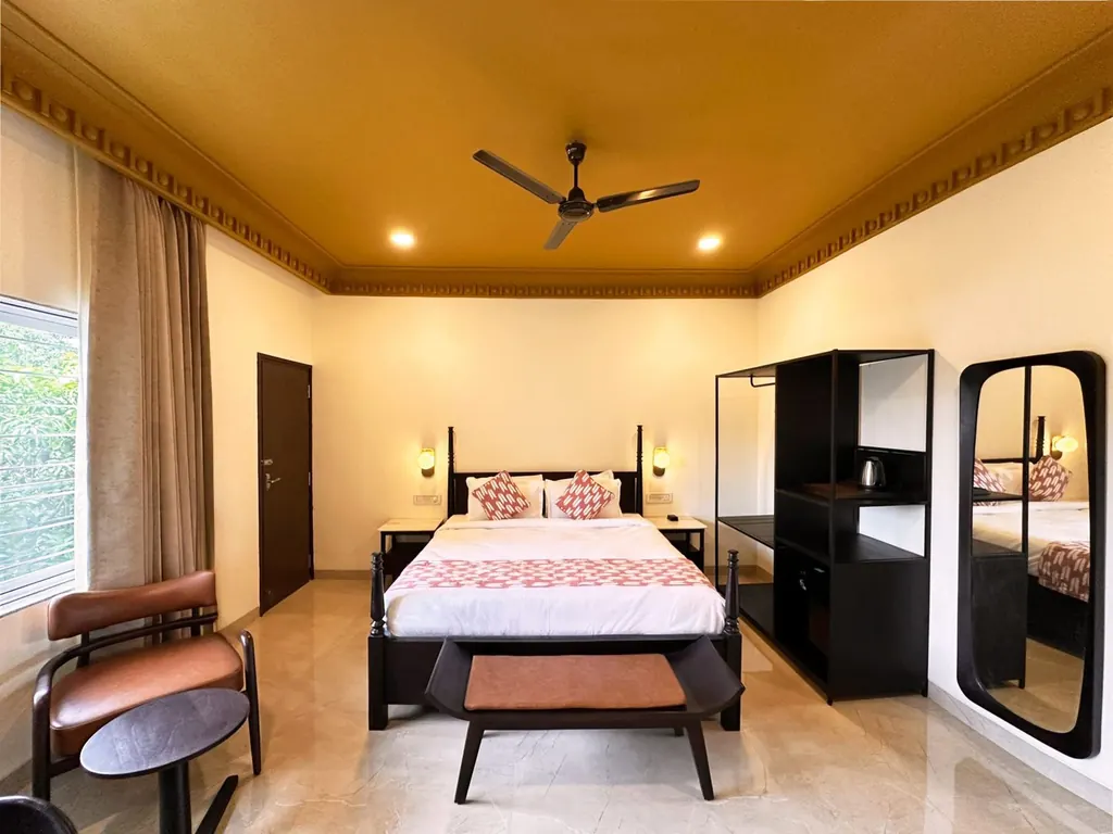 Elite Room with Balcony in Udaipur: King bed and a spacious private balcony over the city