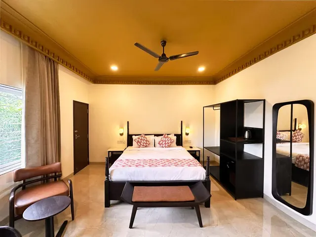 Elite Room with Balcony in Udaipur: King bed and a spacious private balcony over the city