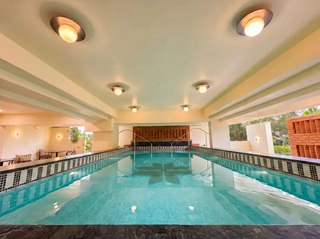 Swimming pool at The Four Stories, Udaipur, with the four-petal motif laid in its tiles